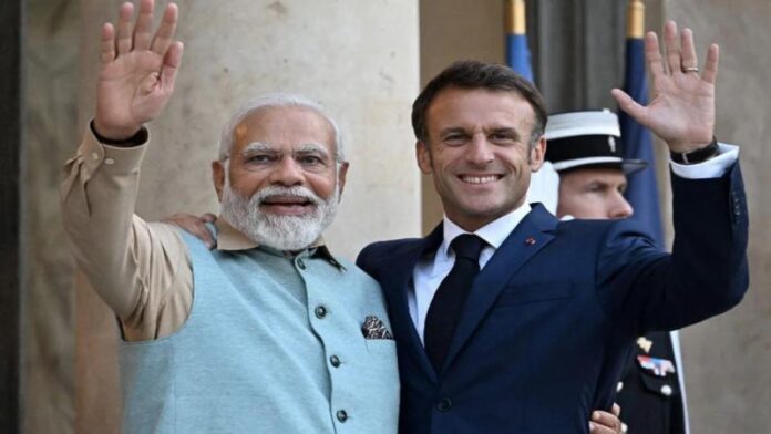 PM-Modi-Macron-Mumbai-meeting_1.jpg